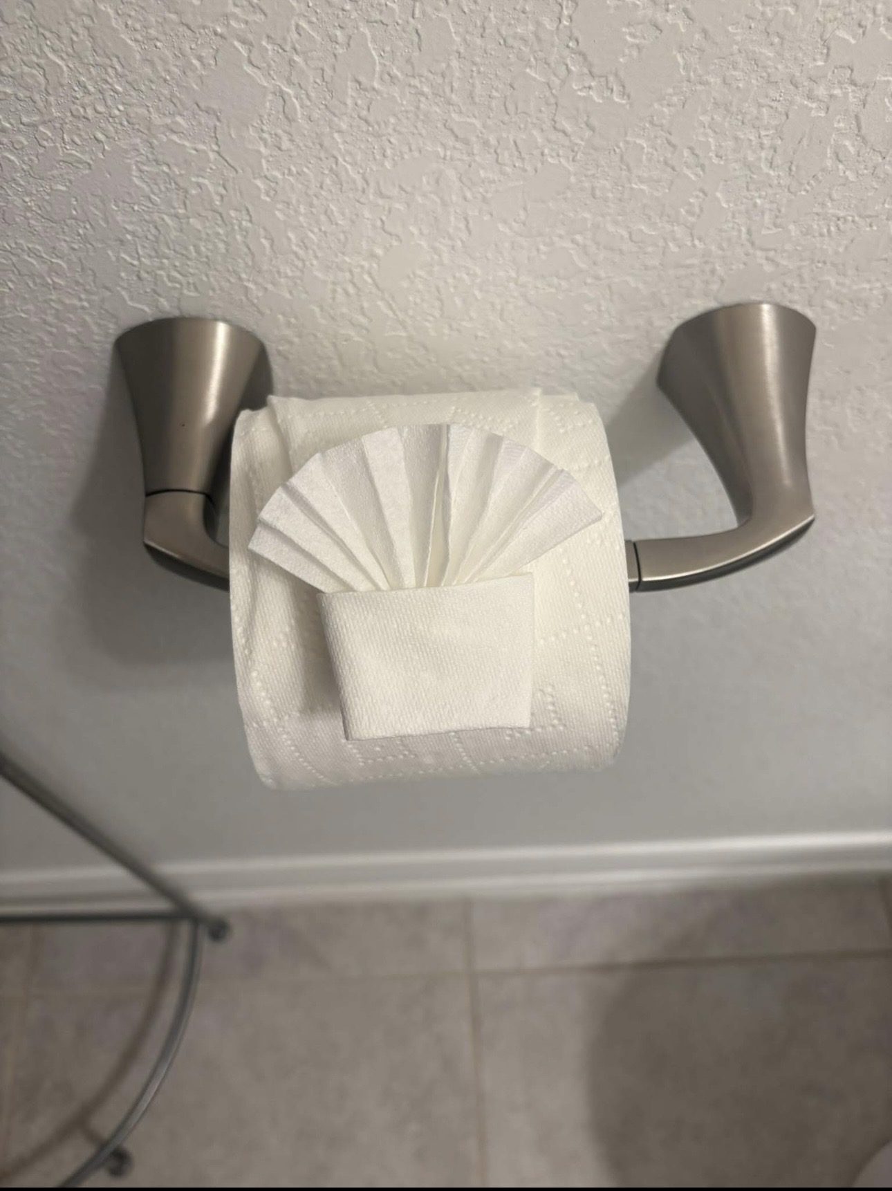 Toilet paper folded into a fan
