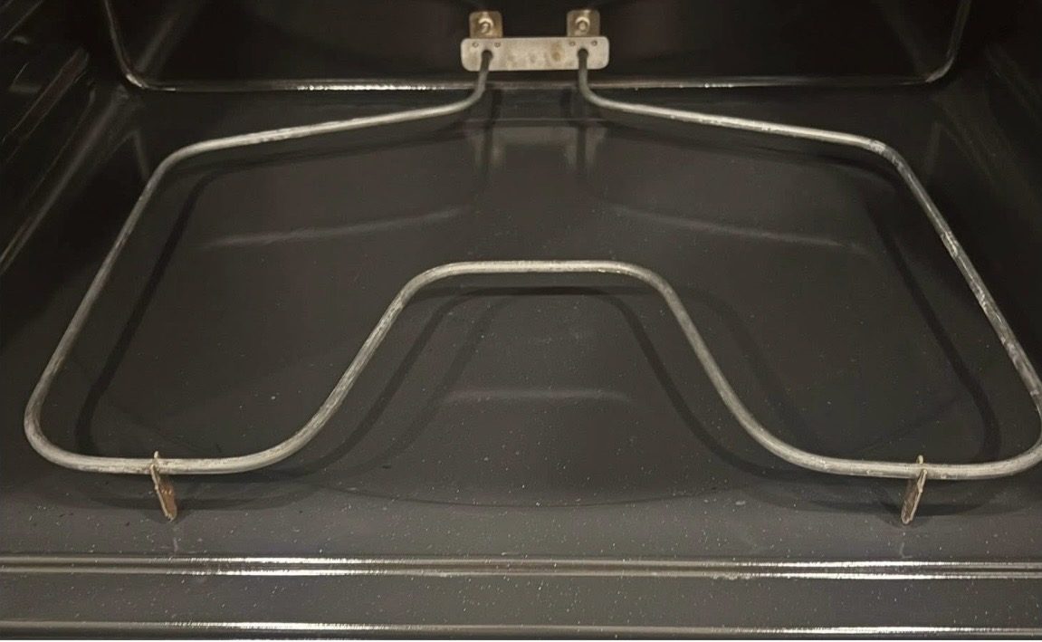 Oven heating element before cleaning