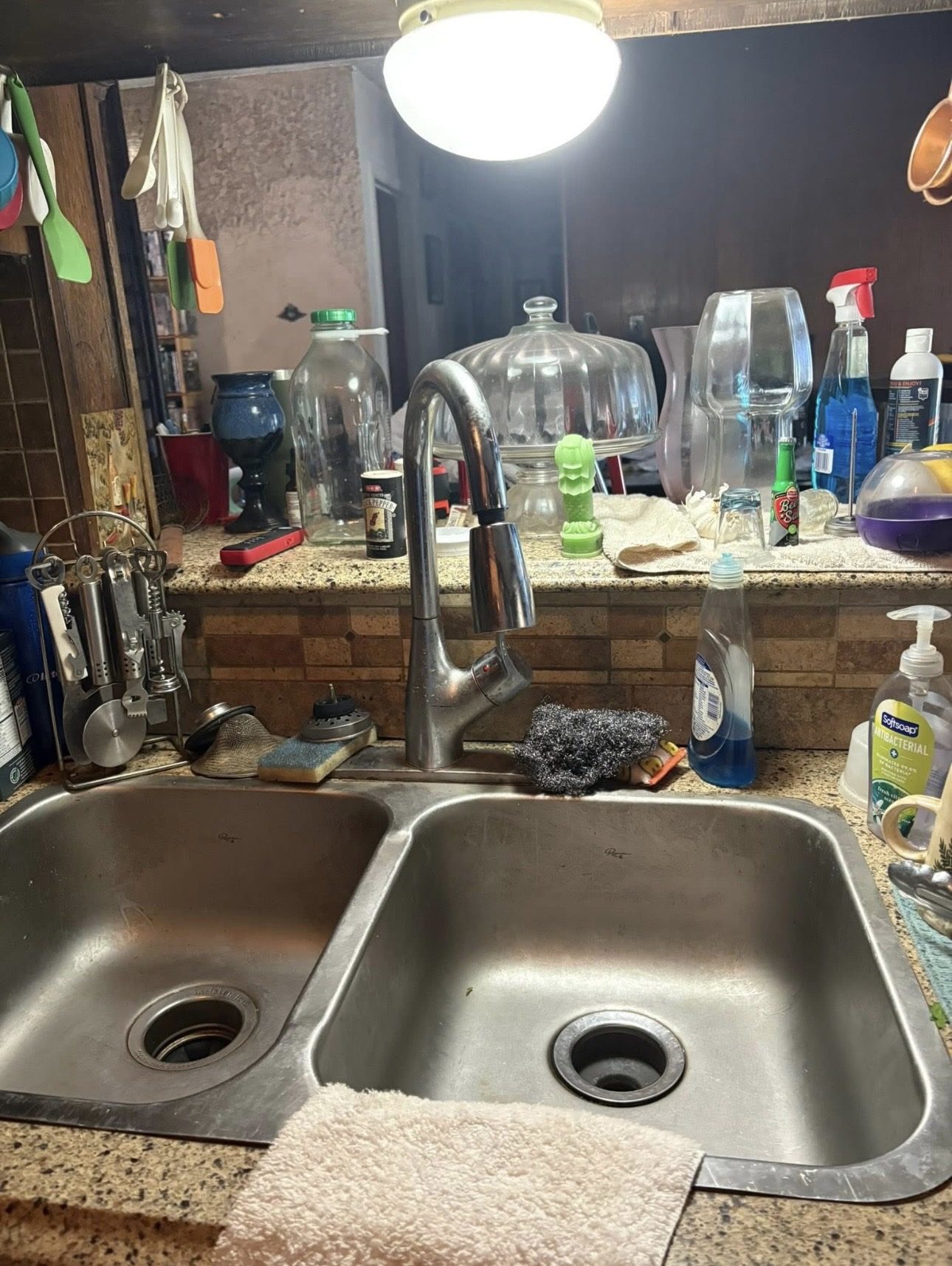 Kitchen sink and counter before cleaning